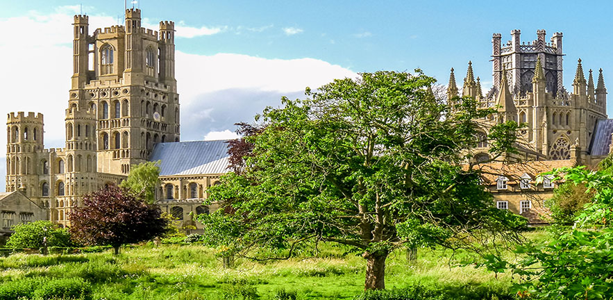 View of historical Ely Cathedral from Cherry Hill Park in summer, Ely, Cambridgeshire, England.